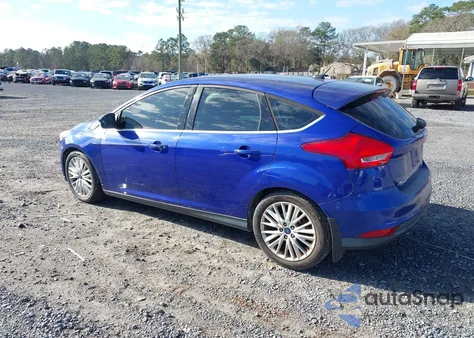 2015 Ford Focus Titanium z USA, uszkodzony, nr VIN 1FADP3N26FL205067